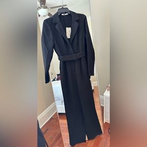 Classy and timeless black bodysuit. Brand new.